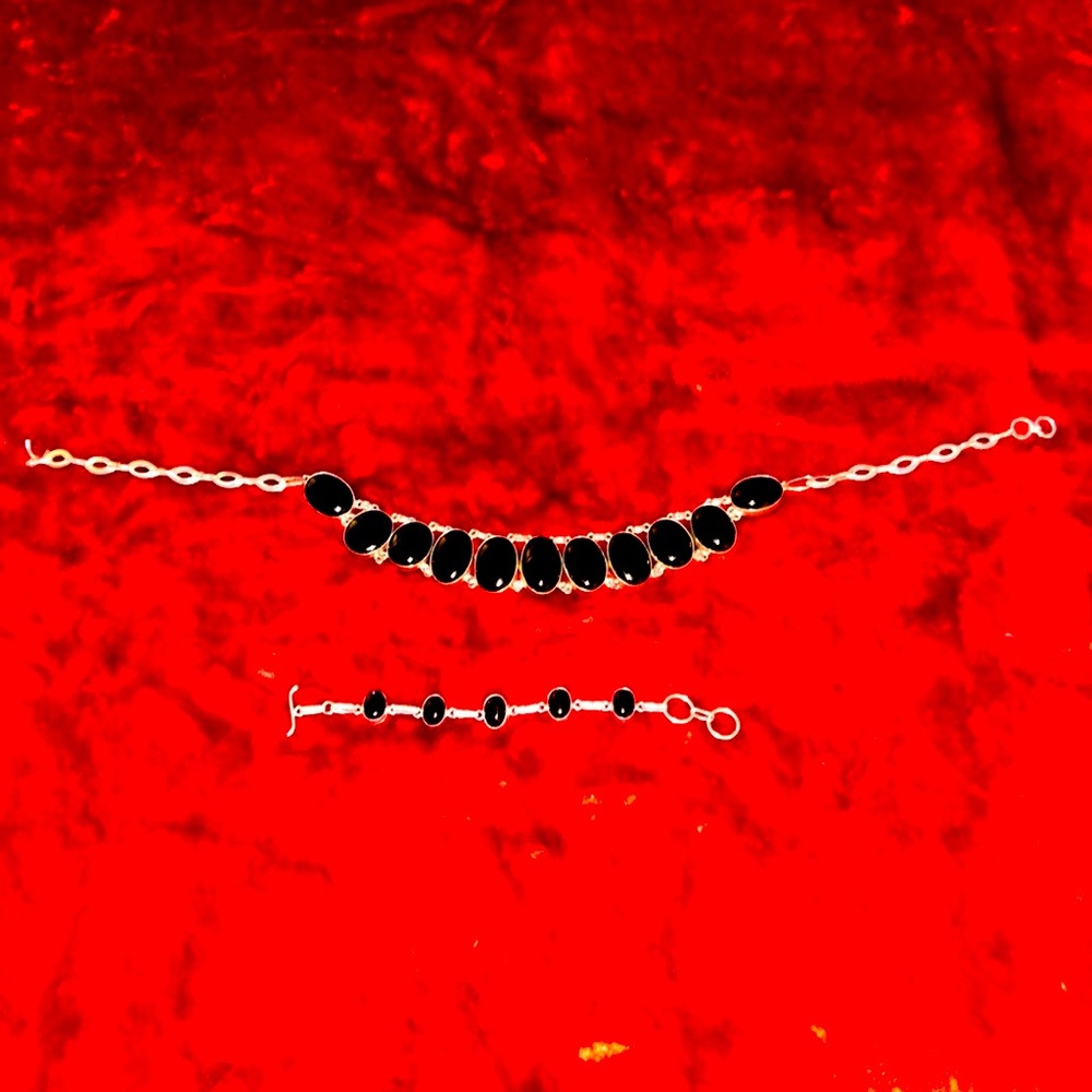18 1/2 inch sterling choker with onyx stones, matching bracelet included with